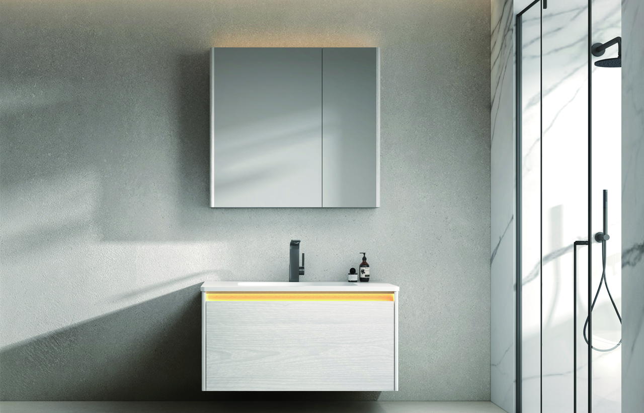 Bathroom layout with a wall-mounted vanity and clear floor access beneath the cabinet