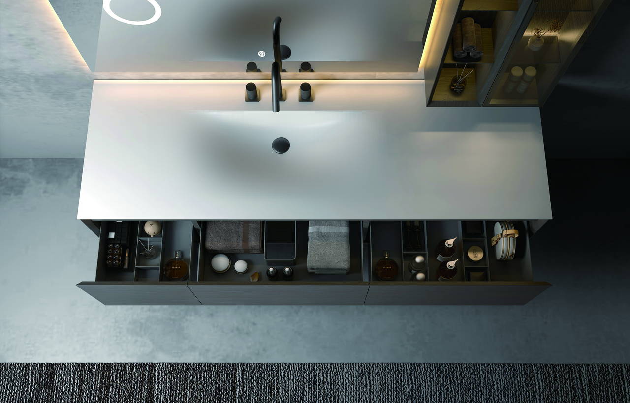 Bathroom vanity assembly with basin, countertop, drawer hardware, handle options, and plumbing cut-out
