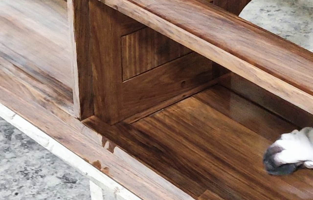Installer reviewing wall support for a wall-mounted bathroom vanity