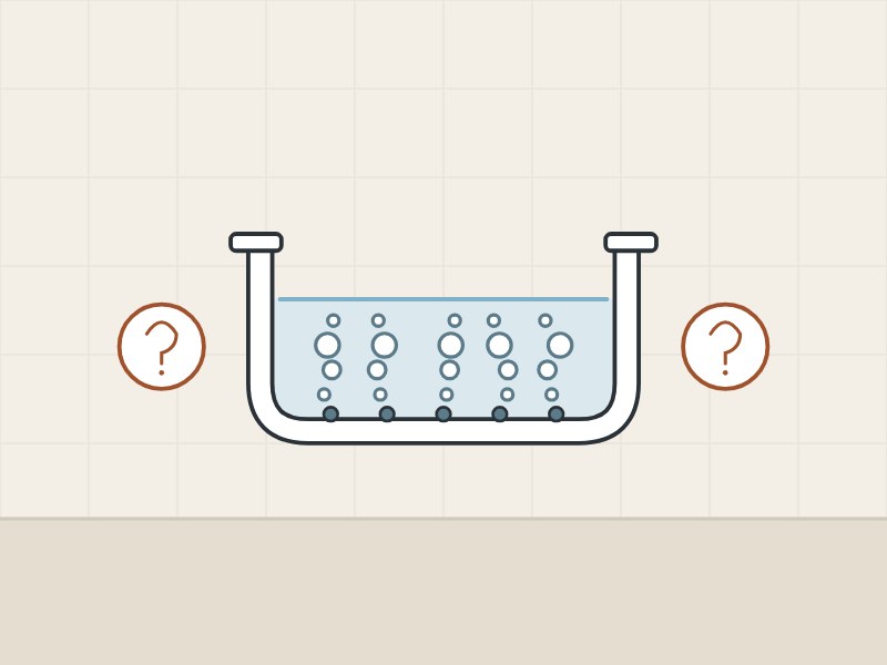 Illustration of a bathtub with rising bubbles between two question marks