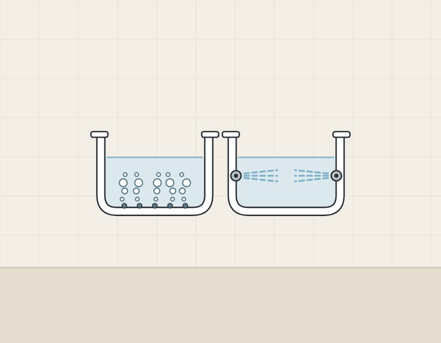Illustration of two bathtubs in section, one with bubbles rising from floor outlets and one with water jets from the walls