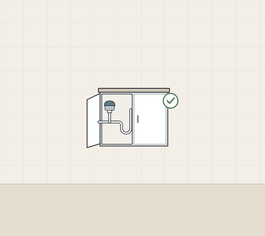 Illustration of a vanity with one door open showing the valve inside, with a tick