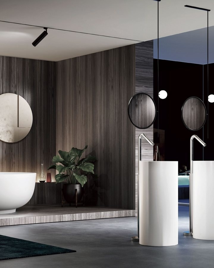 Several solid surface bathtubs shown together in a project setting