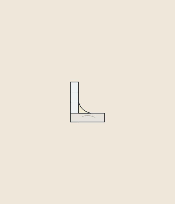 Illustration of a sealant bead in the corner between a tiled wall and a stone top, seen in section
