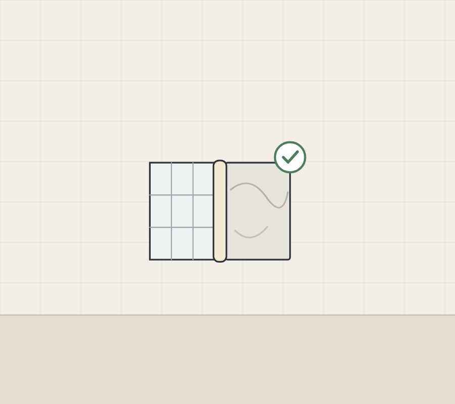 Illustration of a sealant bead between a tiled surface and a stone surface, with a tick