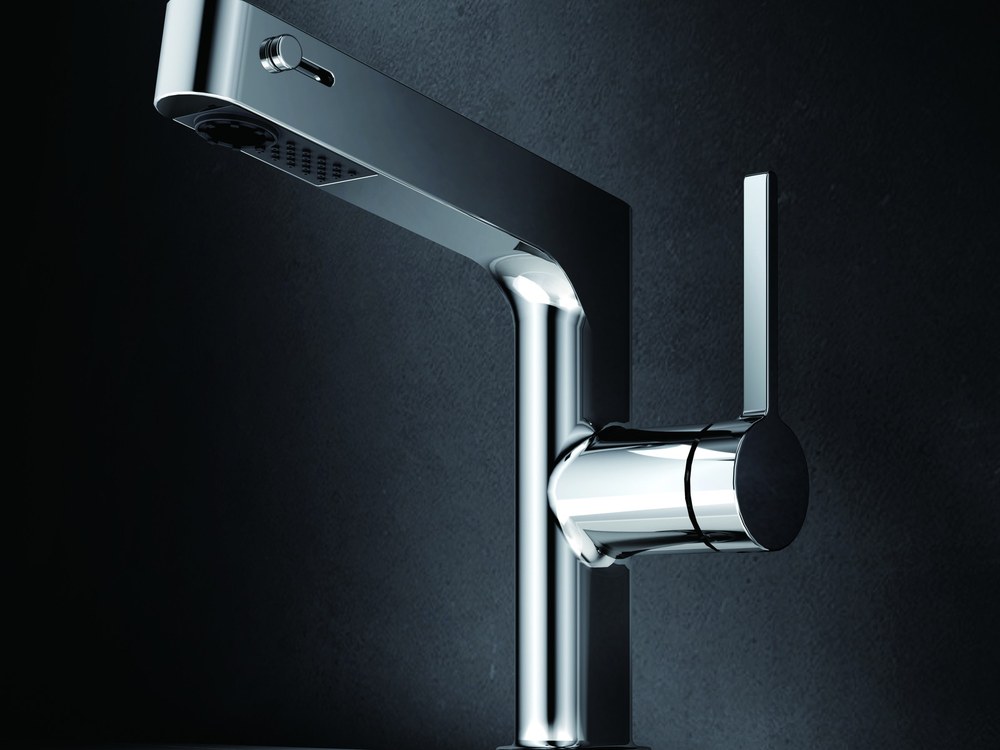 A chrome pull-out basin faucet shown in detail
