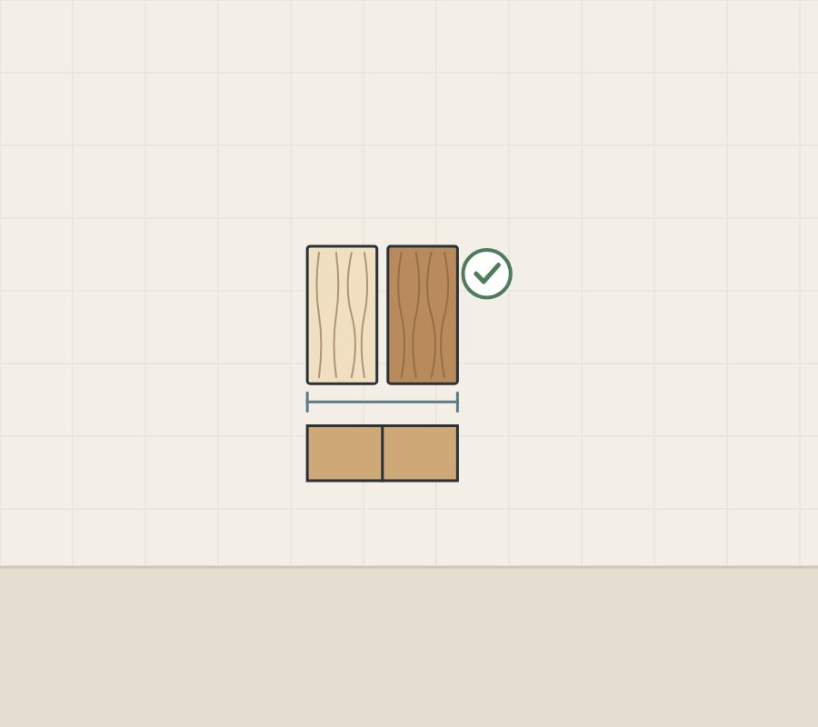 Illustration of a light and a dark panel joined by a bracket above a two-door cabinet, with a check mark