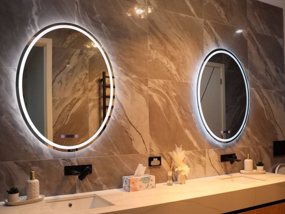 A wall-mounted bathroom vanity in a finished bathroom