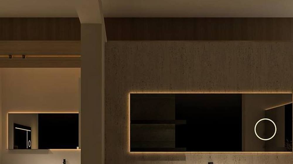 A showroom vanity display with a lit mirror