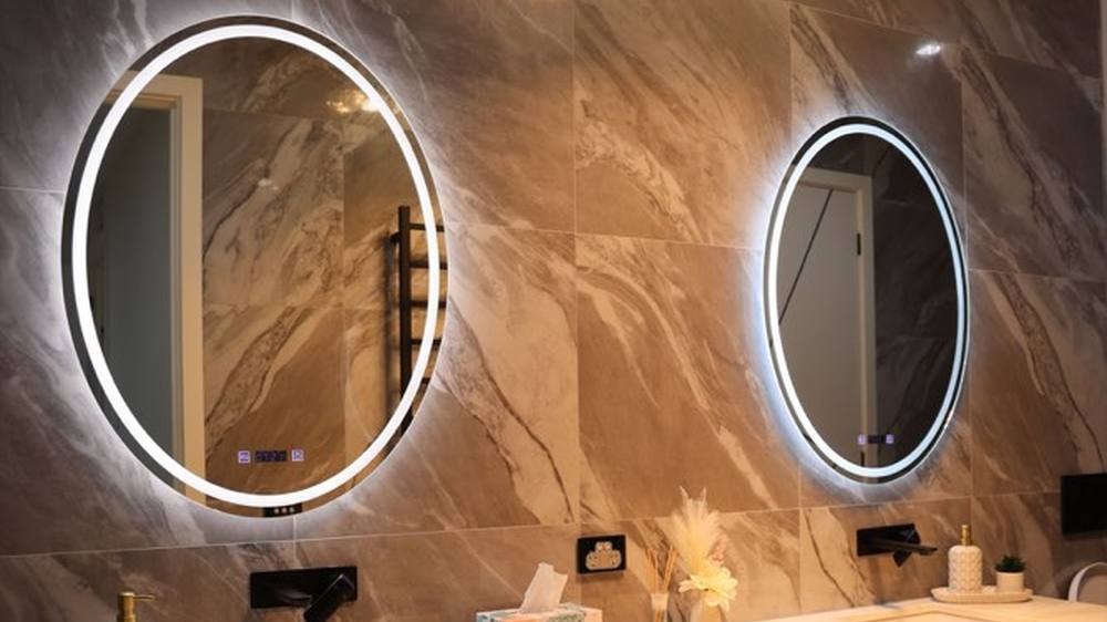 A wall-mounted bathroom vanity in a finished bathroom