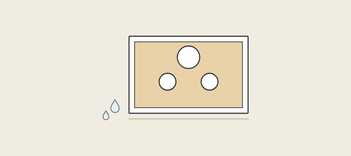 Illustration: the rear panel of a cabinet with three round pipe cutouts and water drops near the floor