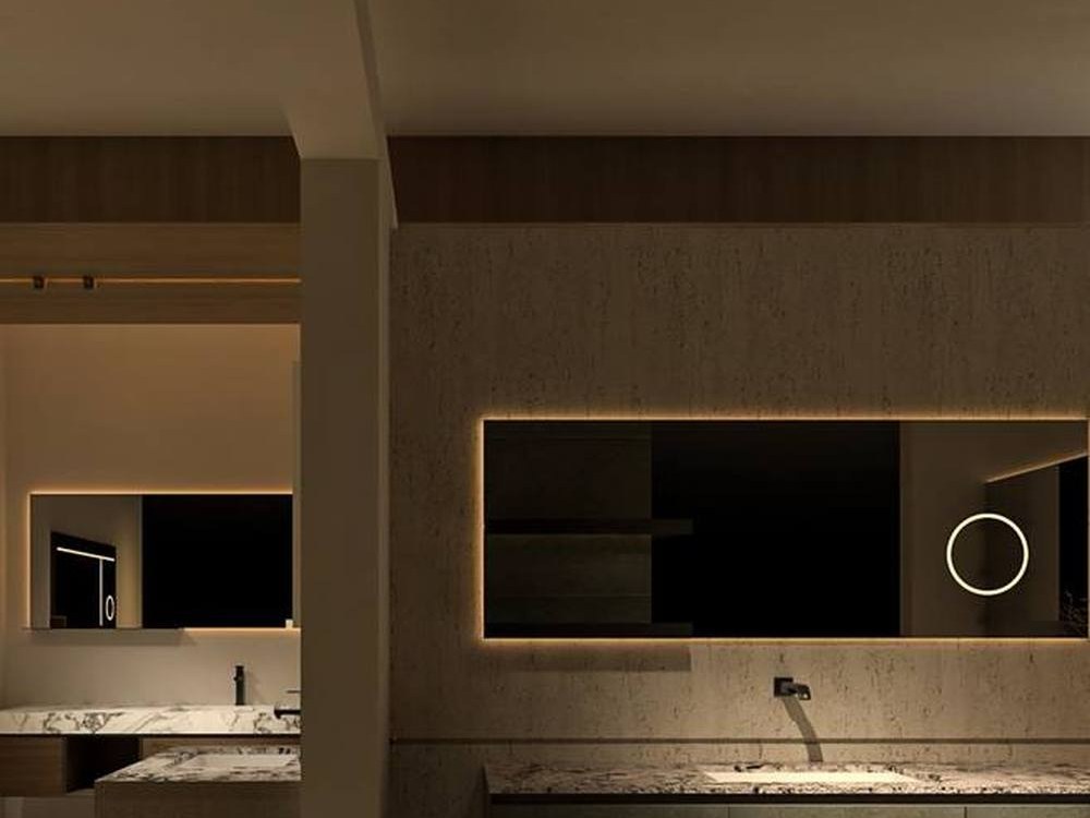 A showroom vanity display with a lit mirror