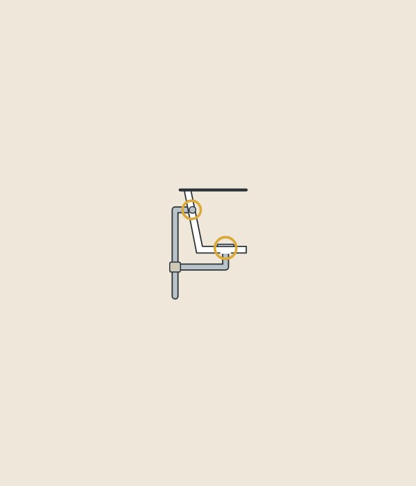 Illustration of the end of a bathtub in section with its overflow and drain ringed