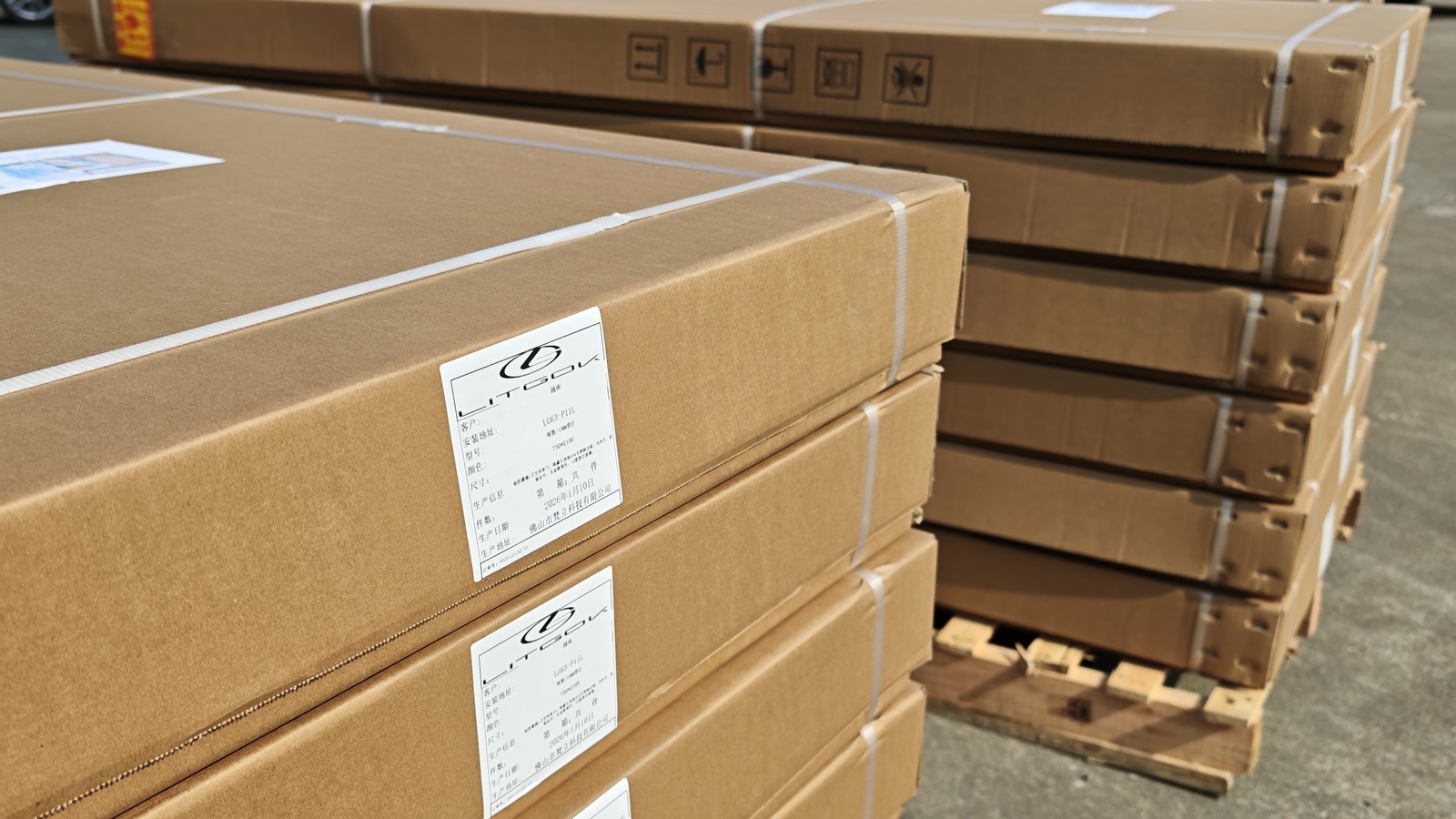 Close view of export cartons with a shipping label on each package