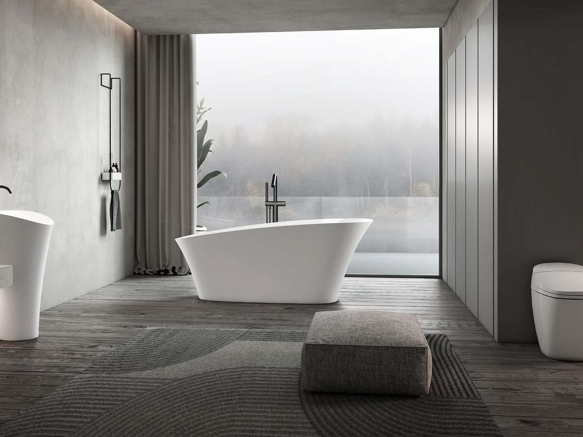 Freestanding bathtub in a hotel suite, sized for a comfortable adult soak