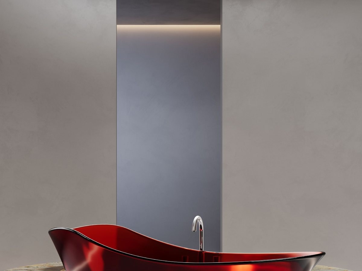 A translucent colored bathtub displayed in a showroom