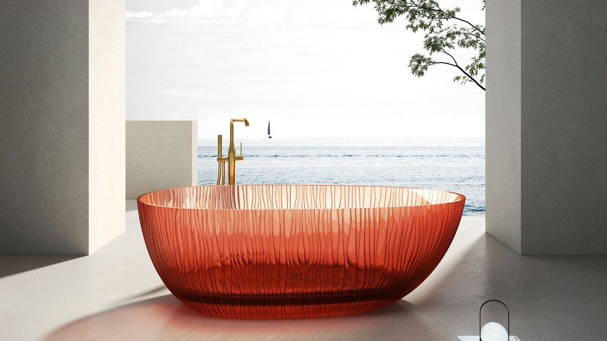 A translucent colored bathtub in a hotel suite