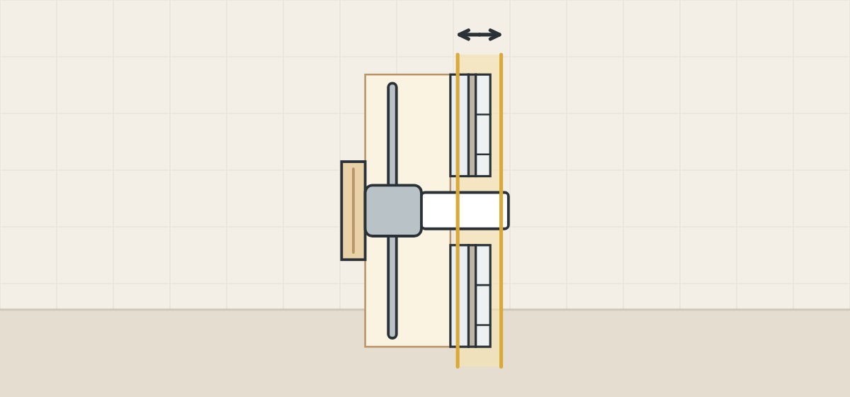 Illustration of a wall section with a shaded band and a double arrow across the tile face
