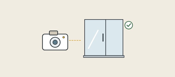 Illustration: a camera pointed at an assembled glass shower enclosure, with a tick