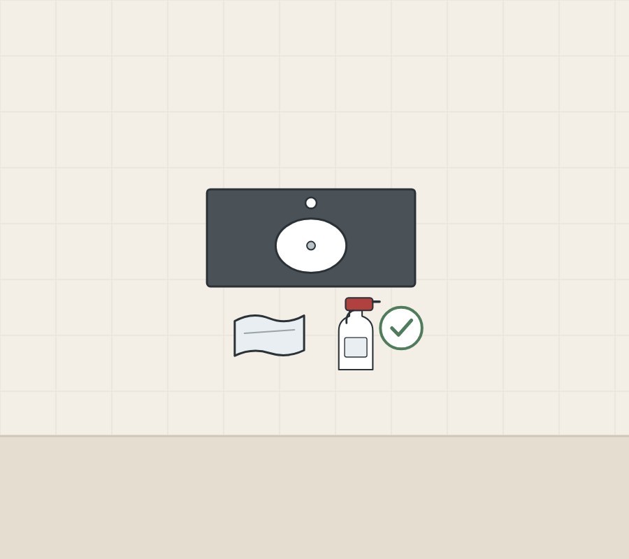 Illustration of a dark vanity top from above with a cloth, a spray bottle and a tick