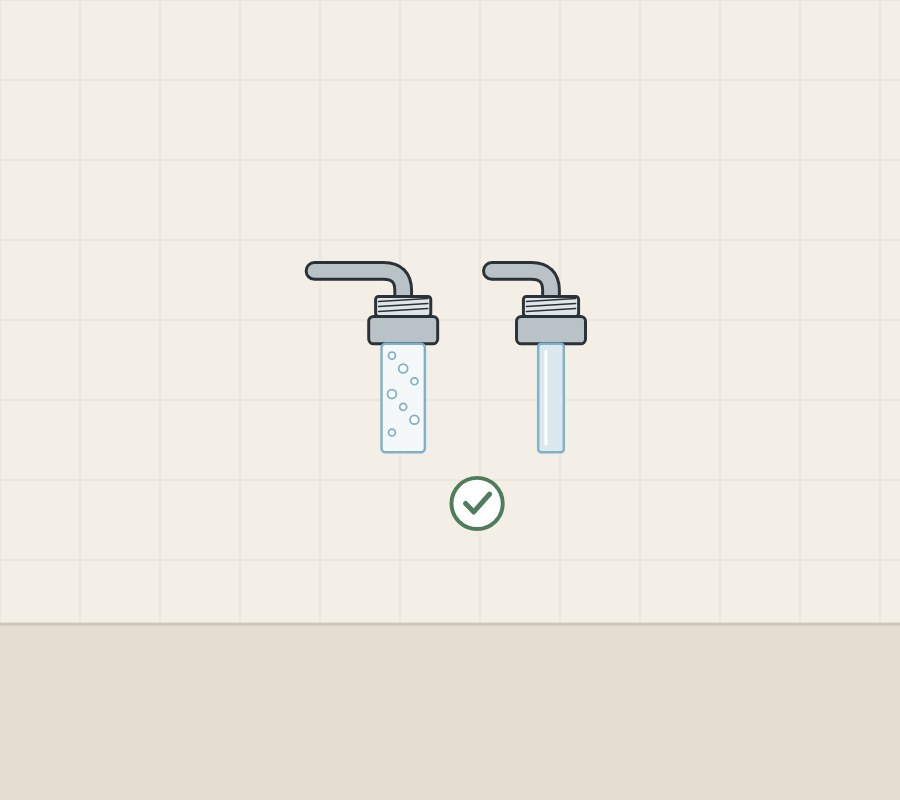 Illustration of a spout with a bubbly stream and a spout with a clear stream above a tick