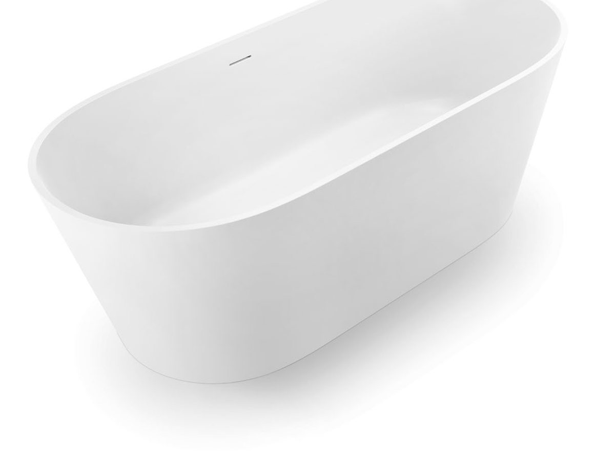 A freestanding bathtub shown to display its proportions