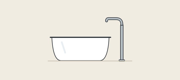 Illustration of a freestanding bathtub beside a floor-standing filler