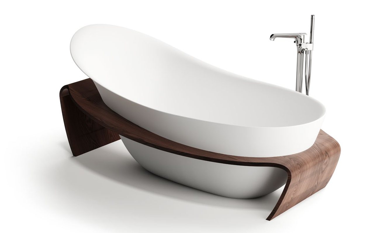 Built-in rectangular bathtub set into a tiled deck surround