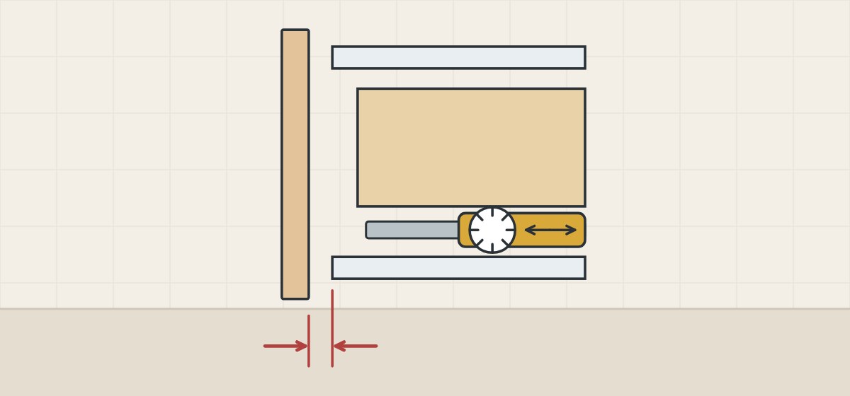 Illustration of a drawer front standing a small marked gap in front of the cabinet edge, with an adjusting wheel on a unit beside the runner