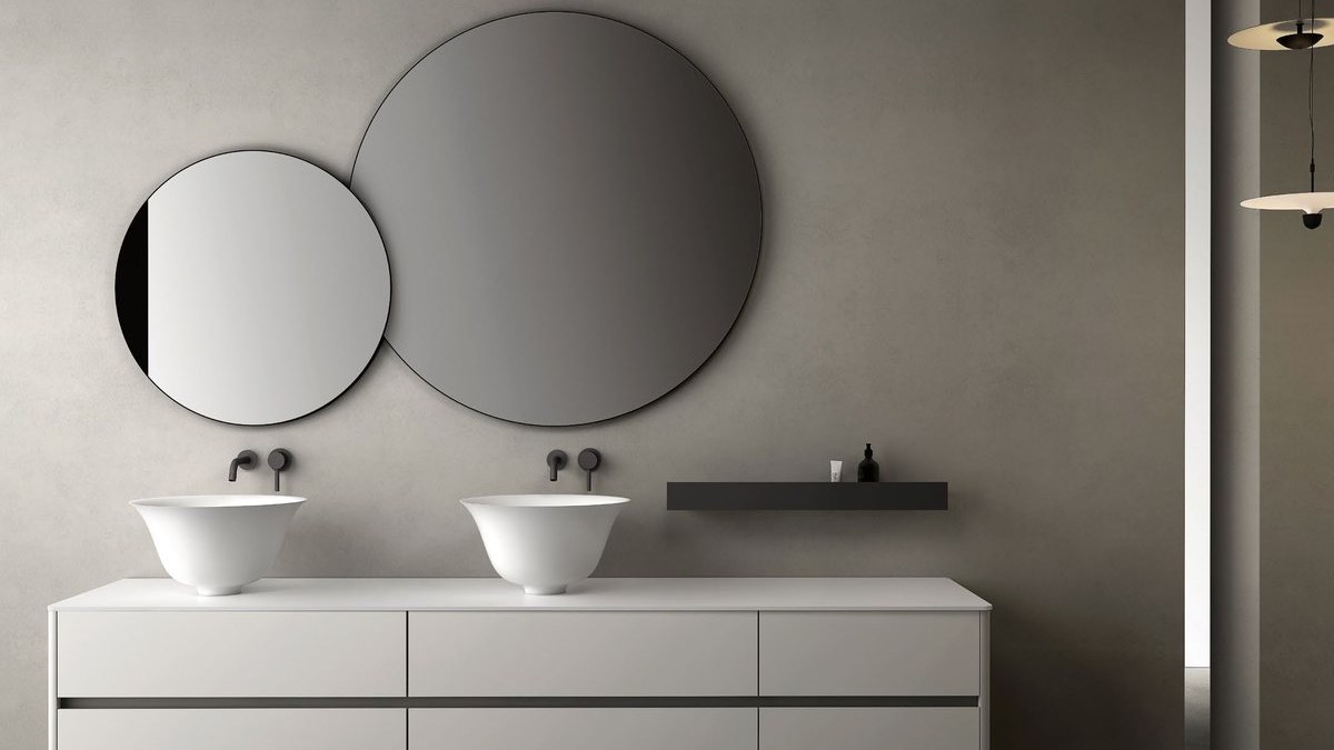 An integrated basin vanity in a commercial bathroom