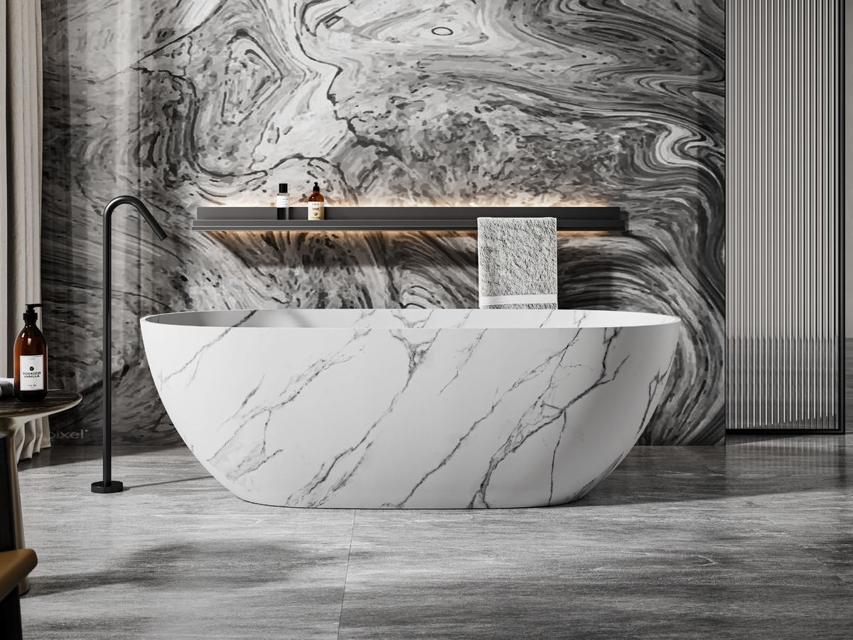 A marble-effect cast bathtub in a spa-style bathroom