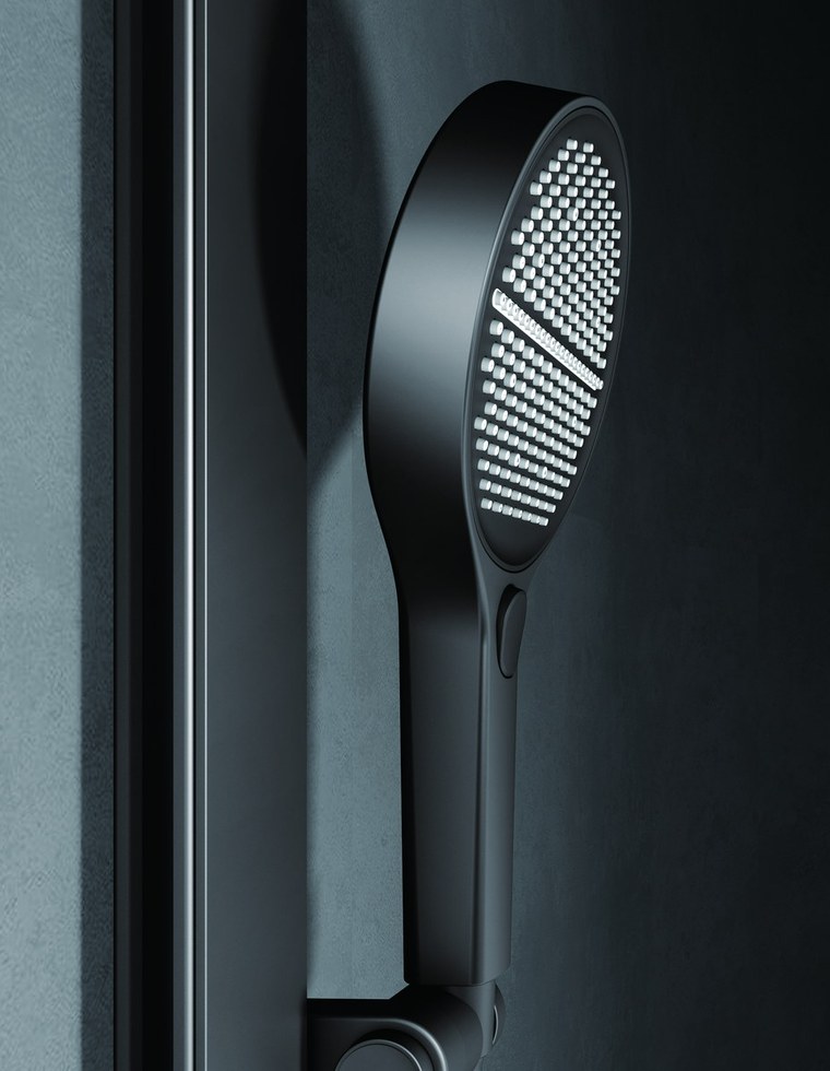 A black hand shower with a textured spray face