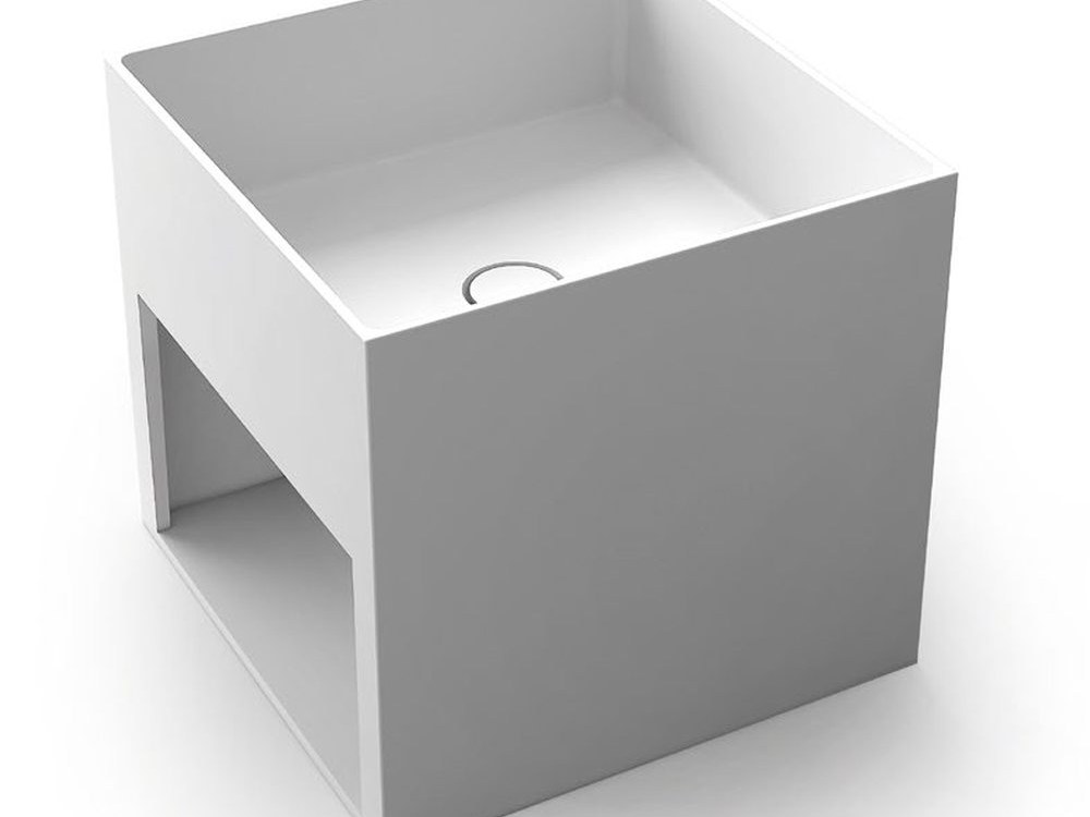 An integrated basin and vanity top formed as one piece