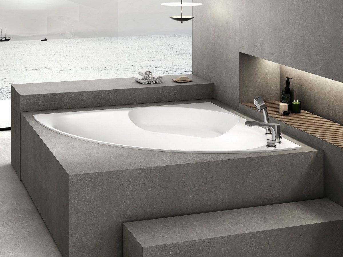 A solid surface bathtub with an even, well-kept finish