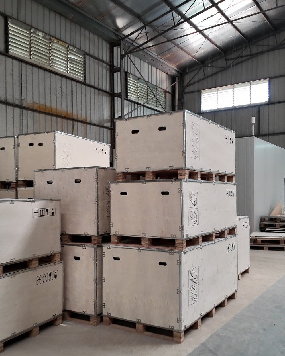 Timber crates stacked in the warehouse ready for loading