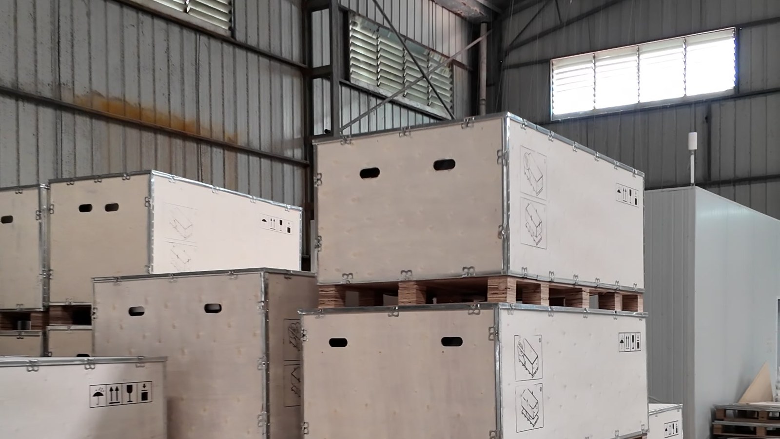 Timber crates stacked in the warehouse ready for loading