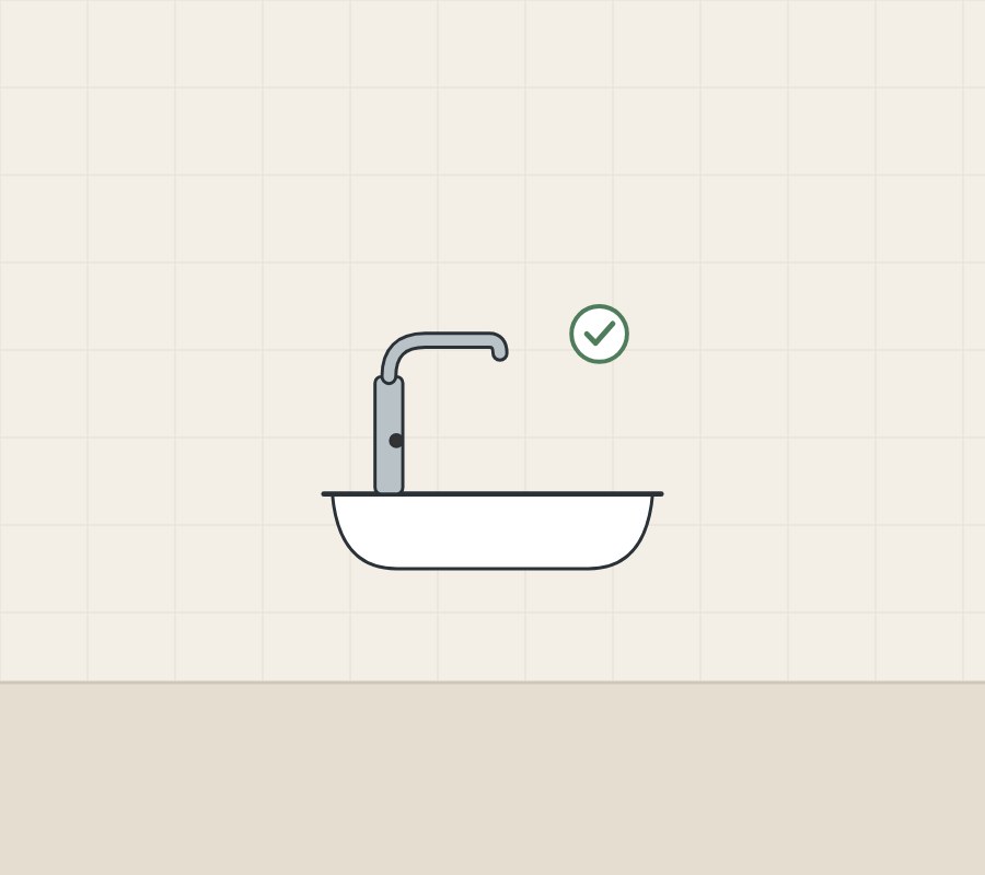 Illustration of a sensor faucet on a basin with a tick