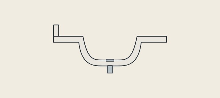 Illustration of a bowl, deck and backsplash formed in one piece, shown in section