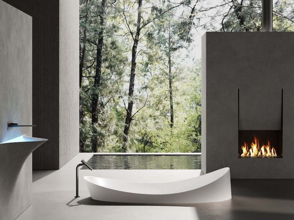 A freestanding solid surface bathtub in a spa setting