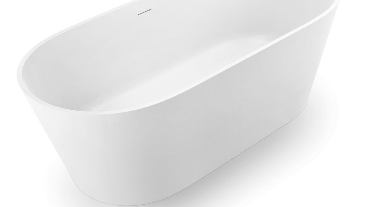 A solid surface bathtub shown with specification information