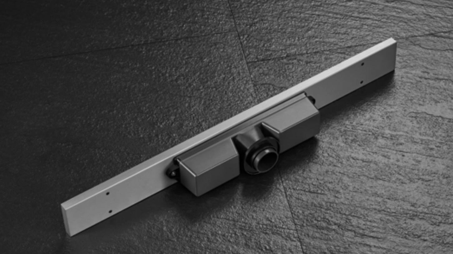A concealed floor drain with a tile-in cover