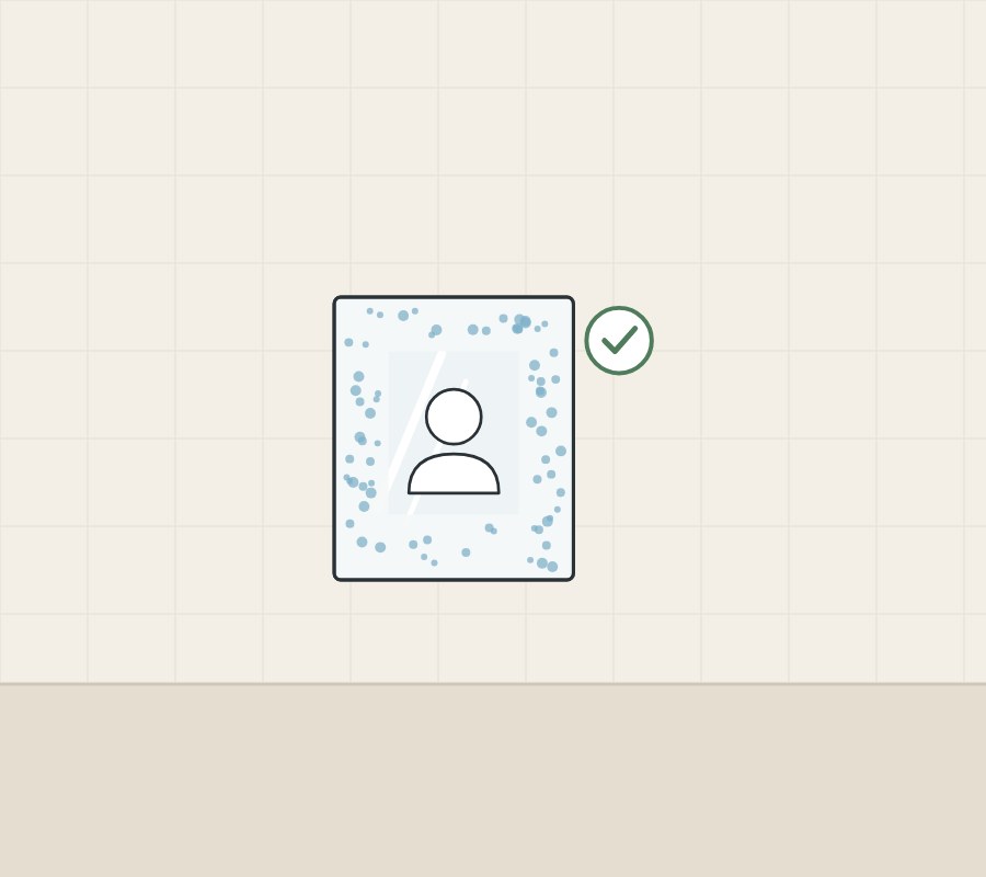 Illustration of a fogged mirror whose clear patch frames a head outline, with a tick