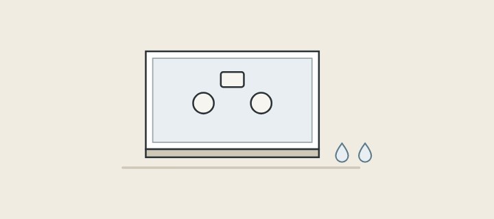 Illustration: the back of a cabinet with pipe cut-outs above its bottom panel, and water droplets on the floor