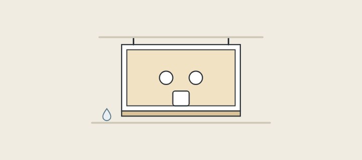 Illustration: a vanity cabinet seen from the rear with pipe cut-outs in its back panel, a bottom panel and a floor line