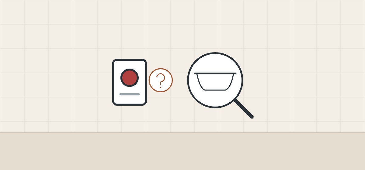 Illustration of a red impact label, a question mark and a magnifier over a bathtub