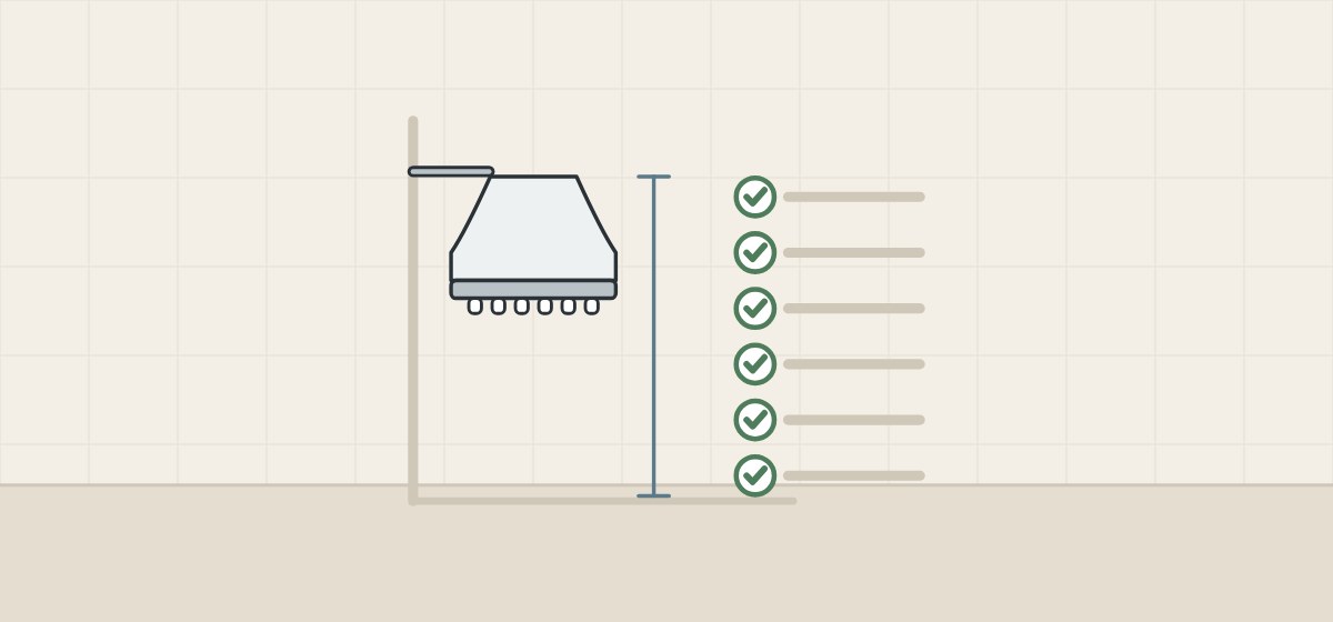 Illustration of a wall-mounted shower head with a height line beside a ticked checklist