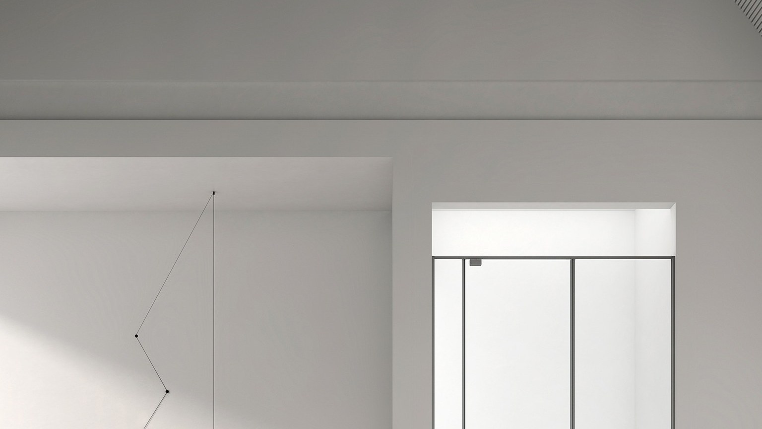A sliding door shower enclosure