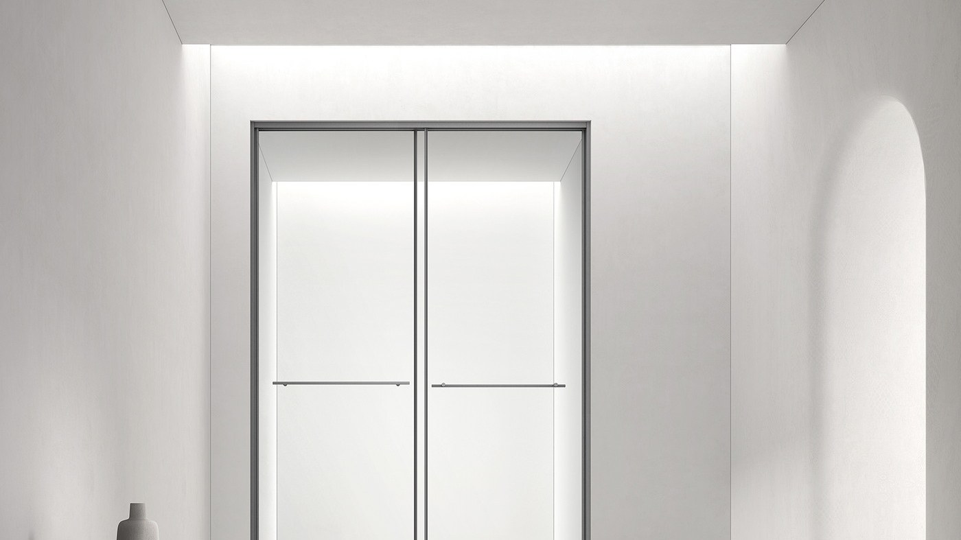 A hinged shower door shown open