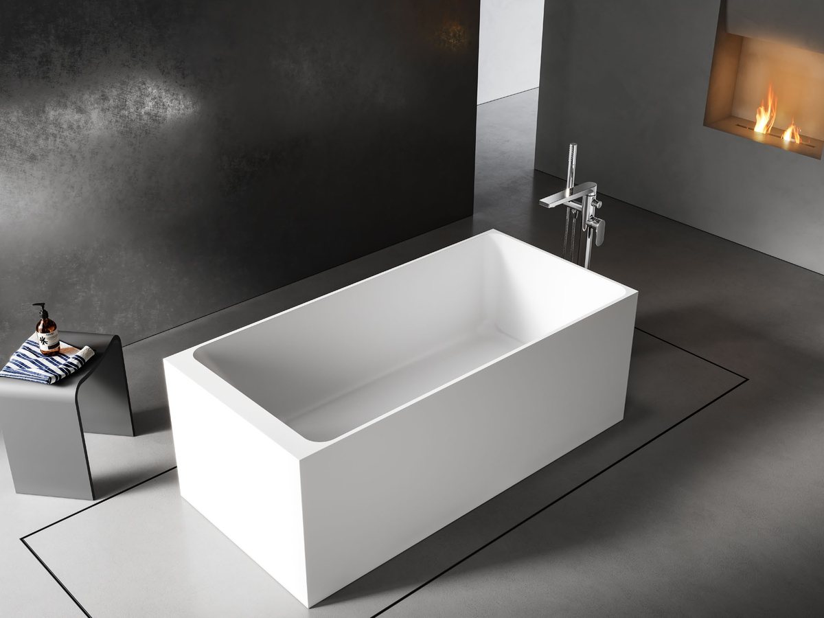 Rectangular freestanding solid surface bathtub with a thick solid rim