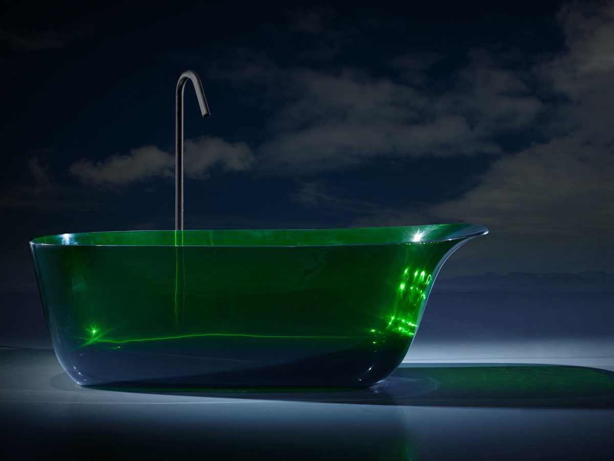 Translucent solid surface bathtub as a statement piece in a project bathroom